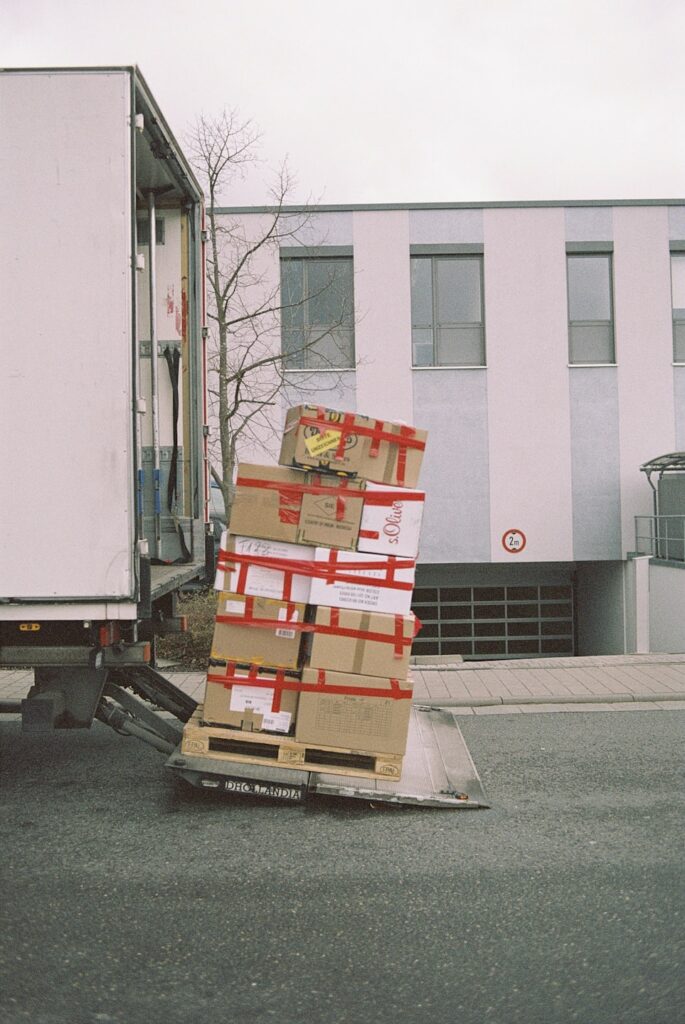 Boxes on the lift gate of a moving truck